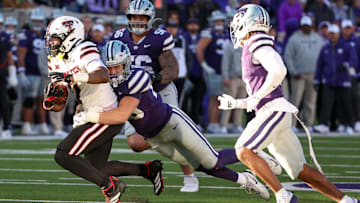 Kansas State Wildcats linebacker Rex Van Wyhe, Texas Tech Red Raiders tight end Terrance Carter Jr.