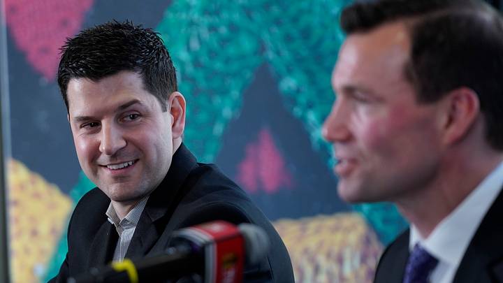 Jun 29, 2022; Chicago, IL, USA; Chicago Blackhawks new head coach Luke Richardson (right) is introduced by Hawks general manager Kyle Davidson, (left) at a press conference at the Chicago Blackhawks Store. Mandatory Credit: David Banks-USA TODAY Sports