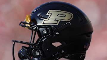 A Purdue Boilermakers helmet sits on the sidelines 