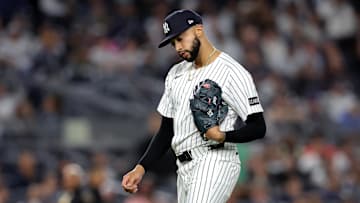 Apr 25, 2025; Bronx, New York, USA; New York Yankees relief pitcher Devin Williams (38) reacts as he walks off the field after being taken out of the game against the Toronto Blue Jays during the ninth inning at Yankee Stadium. Mandatory Credit: Brad Penner-Imagn Images
