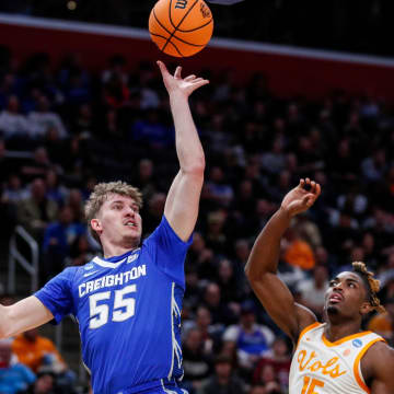 Creighton guard Baylor Scheierman (55) makes a jump shot against Tennessee guard Jahmai Mashack (15) during the first half of the NCAA tournament Midwest Regional Sweet 16 round at Little Caesars Arena in Detroit on Friday, March 29, 2024.