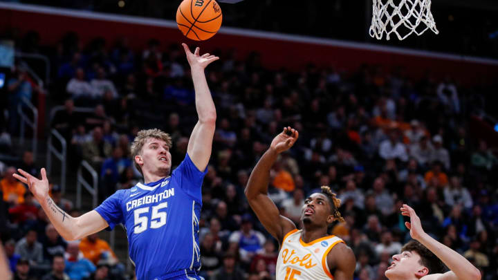 Creighton guard Baylor Scheierman (55) makes a jump shot against Tennessee guard Jahmai Mashack (15) during the first half of the NCAA tournament Midwest Regional Sweet 16 round at Little Caesars Arena in Detroit on Friday, March 29, 2024.