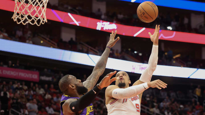 Nov 8, 2023; Houston, Texas, USA; Houston Rockets forward Dillon Brooks (9) shoots against Los Angeles Lakers forward LeBron James (23) in the first quarter at Toyota Center. Mandatory Credit: Thomas Shea-USA TODAY Sports