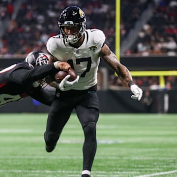 Aug 23, 2024; Atlanta, Georgia, USA; Jacksonville Jaguars tight end Evan Engram (17) is pushed out of bounds by Atlanta Falcons linebacker Bradlee Anae (47) in the second quarter at Mercedes-Benz Stadium. Mandatory Credit: Brett Davis-Imagn Images