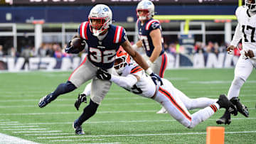 Oct 26, 2025; Foxborough, Massachusetts, USA;  Cleveland Browns linebacker Mohamoud Diabate (43) tackesl New England Patriots running back Treveyon Henderson (32) during the fourth quarter at Gillette Stadium. Mandatory Credit: Bob DeChiara-Imagn Images