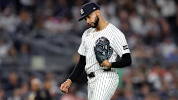 Apr 25, 2025; Bronx, New York, USA; New York Yankees relief pitcher Devin Williams (38) reacts as he walks off the field after being taken out of the game against the Toronto Blue Jays during the ninth inning at Yankee Stadium. Mandatory Credit: Brad Penner-Imagn Images