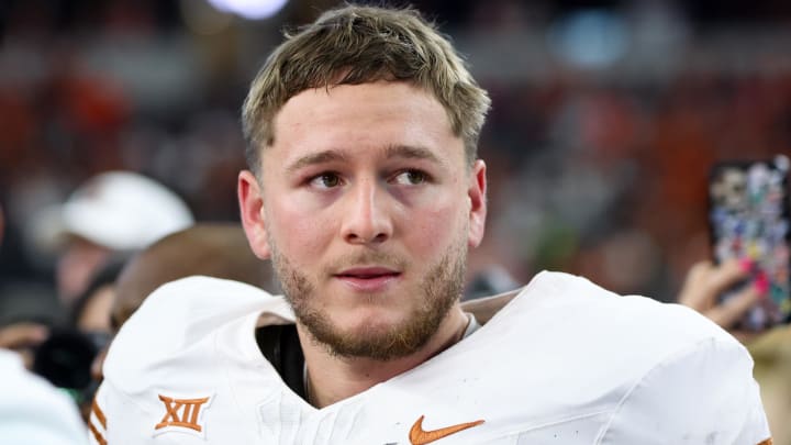 Dec 2, 2023; Arlington, TX, USA;  Texas Longhorns quarterback Quinn Ewers (3) reacts after the win against the Oklahoma State Cowboys at AT&T Stadium. Mandatory Credit: Kevin Jairaj-USA TODAY Sports