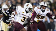 Nov 22, 2025; Boulder, Colorado, USA; Arizona State Sun Devils running back Raleek Brown (3) carries the ball in the first quarter against the Colorado Buffaloes at Folsom Field. Mandatory Credit: Ron Chenoy-Imagn Images