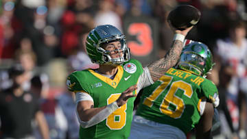 Jan 1, 2025; Pasadena, CA, USA; Oregon Ducks quarterback Dillon Gabriel (8) throws a pass in the first quarter against the Ohio State Buckeyes in the 2025 Rose Bowl college football quarterfinal game at Rose Bowl Stadium.