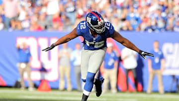 October 21, 2012; East Rutherford, NJ, USA; New York Giants defensive end Jason Osi Umenyiora (72) celebrates after sacking Washington Redskins quarterback Robert Griffin III (not pictured) during the fourth quarter of an NFL game at MetLife Stadium. Mandatory Credit: Brad Penner-Imagn Images