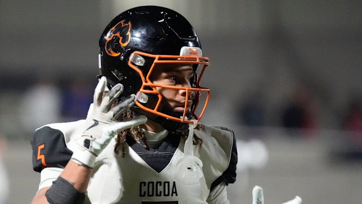 Cocoa High wide receiver Jayvan Boggs (#5). Cocoa High School defeated Cardinal Mooney Catholic High School 31-21 to win the Class 2A semi-final game Friday night in Sarasota.