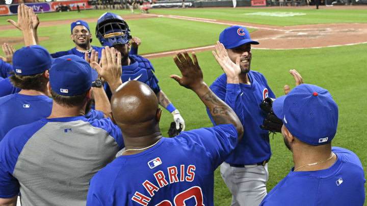 Jul 11, 2024; Baltimore, Maryland, USA;  Chicago Cubs pitcher Jorge López (41) celebrates with teammates after the game against the Baltimore Orioles at Oriole Park at Camden Yards.