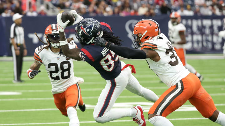 Dec 24, 2023; Houston, Texas, USA; Houston Texans wide receiver Noah Brown (85) makes a catch against the Houston Texans tight end Dalton Schultz (86) in the second half at NRG Stadium. Mandatory Credit: Thomas Shea-USA TODAY Sports