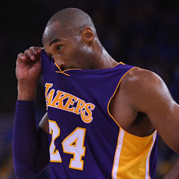 November 1, 2014; Oakland, CA, USA; Los Angeles Lakers guard Kobe Bryant (24) reacts during the fourth quarter against the Golden State Warriors at Oracle Arena. The Warriors defeated the Lakers 127-104. Mandatory Credit: Kyle Terada-Imagn Images