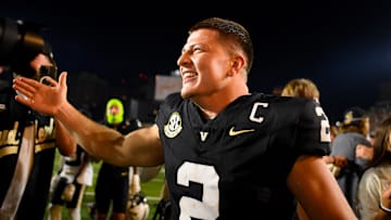 Nov 8, 2025; Nashville, Tennessee, USA;  Vanderbilt Commodores quarterback Diego Pavia (2) celebrates the win against the Auburn Tigers during the overtime period at FirstBank Stadium. Mandatory Credit: Steve Roberts-Imagn Images