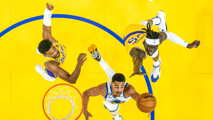 May 10, 2023; San Francisco, California, USA; Golden State Warriors guard Jordan Poole (3) shoots the basketball against Los Angeles Lakers guard Malik Beasley (5) and forward Wenyen Gabriel (35) during the second half in game five of the 2023 NBA playoffs conference semifinals round at Chase Center. Mandatory Credit: Kyle Terada-USA TODAY Sports