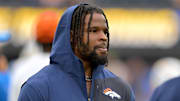 Denver Broncos linebacker Dre Greenlaw (57) on the sidelines prior to the game against the Los Angeles Chargers at SoFi Stadium.