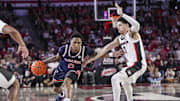 Jan 18, 2025; Athens, Georgia, USA; Auburn Tigers guard Tahaad Pettiford (0) dribbles against Georgia Bulldogs guard Dakota Leffew (1) at Stegeman Coliseum. Mandatory Credit: Dale Zanine-Imagn Images