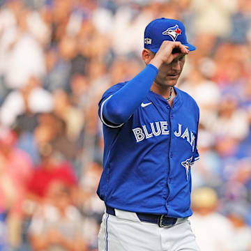 Toronto Blue Jays starting pitcher Bowden Francis (44) tips hits cap to the crowd as he walks towards the dugout after being relieved against the New York Mets during the ninth inning at Rogers Centre on Sept 11.