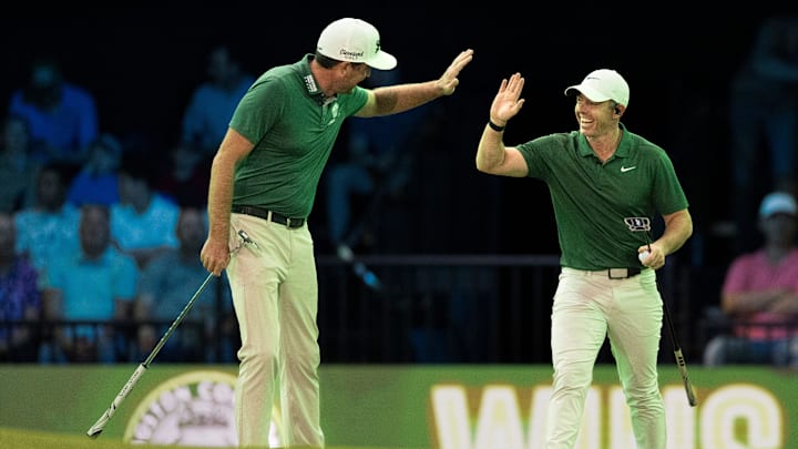 Rory McIlroy
and Keegan Bradley of
Boston Common Golf high five after making a shot against Los Angeles Golf Club at SoFi Center on January 2, 2026, in Palm Beach Gardens, Florida.