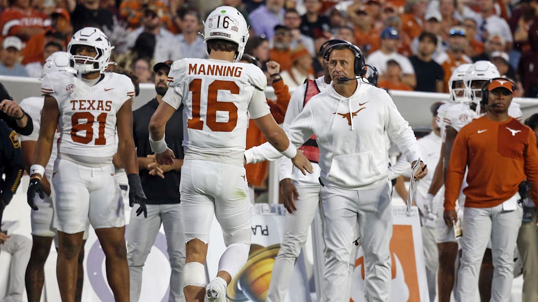 Oct 25, 2025; Starkville, Mississippi, USA; Texas Longhorns head coach Steve Sarkisian reacts with quarterback Arch Manning (16).