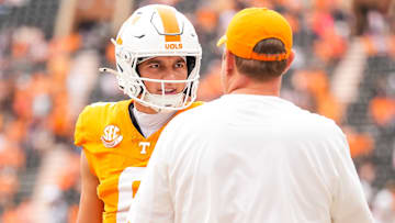 Tennessee quarterback Joey Aguilar (6) and Tennessee head coach Josh Heupel chat before Tennessee's home opener against ETSU at Neyland Stadium in Knoxville, Tenn., on Sept. 6, 2025.