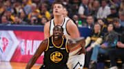 Apr 27, 2022; San Francisco, California, USA; Golden State Warriors forward Draymond Green (23) battles for position with Denver Nuggets center Nikola Jokic (15) in the first quarter during game five of the first round for the 2022 NBA playoffs at Chase Center. Mandatory Credit: Cary Edmondson-Imagn Images