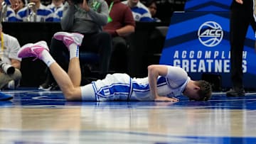 Mar 13, 2025; Charlotte, NC, USA; Duke Blue Devils forward Cooper Flagg (2) is injured in the first half at Spectrum Center. Mandatory Credit: Bob Donnan-Imagn Images