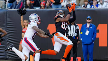 Cincinnati Bengals wide receiver Mitchell Tinsley (82) catches a pass in the end zone for a touchdown in the fourth quarter of the NFL Week 12 game between the Cincinnati Bengals and the New England Patriots at Paycor Stadium in downtown Cincinnati on Sunday, Nov. 23, 2025. The Bengals fall to 3-8 with a 26-20 loss at home.