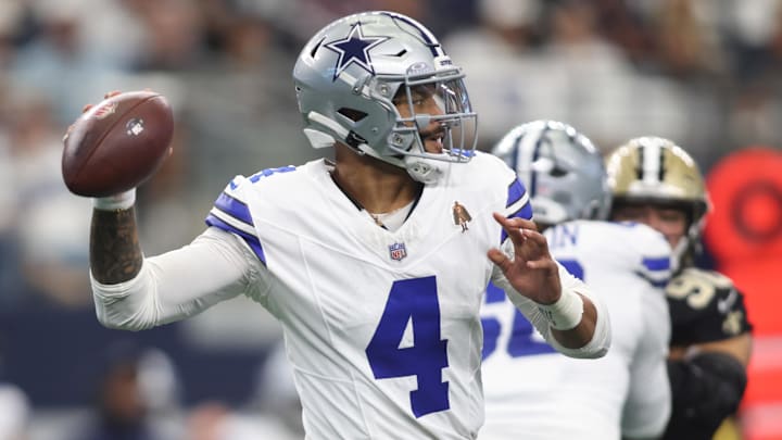 Sep 15, 2024; Arlington, Texas, USA; Dallas Cowboys quarterback Dak Prescott (4) throws against the New Orleans Saints in the first quarter  at AT&T Stadium. Mandatory Credit: Tim Heitman-Imagn Images