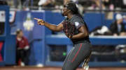 Jun 2, 2024; Oklahoma City, OK, USA; Stanford Cardinals starting pitcher NiJaree Canady (24) points to her catcher after striking out a UCLA Bruins batter in the fourth inning during a Women's College World Series softball losers bracket elimination game at Devon Park