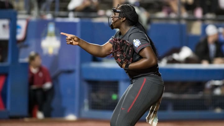 Jun 2, 2024; Oklahoma City, OK, USA; Stanford Cardinals starting pitcher NiJaree Canady (24) points to her catcher after striking out a UCLA Bruins batter in the fourth inning during a Women's College World Series softball losers bracket elimination game at Devon Park