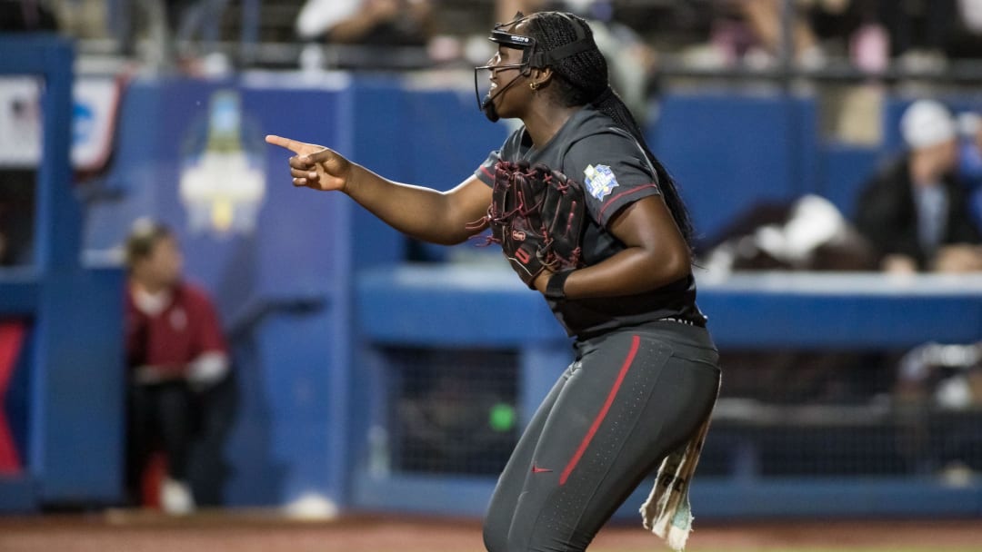 Jun 2, 2024; Oklahoma City, OK, USA; Stanford Cardinals starting pitcher NiJaree Canady (24) points to her catcher after striking out a UCLA Bruins batter in the fourth inning during a Women's College World Series softball losers bracket elimination game at Devon Park. Mandatory Credit: Brett Rojo-USA TODAY Sports