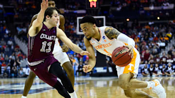 Tennessee guard Lamonte Turner (1) drives past Colgate guard Jack Ferguson (13) during their first round game of the NCAA Tournament at Nationwide Arena in Columbus, Ohio, on Friday, March 22, 2019. 

Kns Utbasketball Vs Colgate Ncaa Tournament Bp Jpg