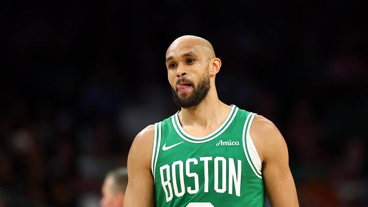 Feb 24, 2026; Phoenix, Arizona, USA; Boston Celtics guard Derrick White (9) against the Phoenix Suns at Mortgage Matchup Center. Mandatory Credit: Mark J. Rebilas-Imagn Images