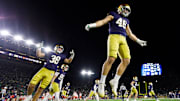 Notre Dame linebacker Jerry Rullo (46) hypes up the crowd after a kickoff in the second half of a NCAA football game against Syracuse at Notre Dame Stadium on Saturday, Nov. 22, 2025, in South Bend.