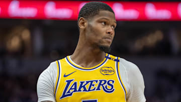 Former Los Angeles Lakers forward Cam Reddish (5) enters the court after a timeout in the second quarter against the Minnesota Timberwolves at Target Center.