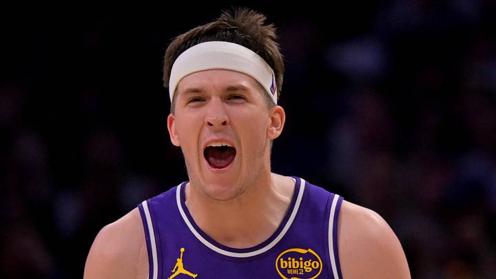 Feb 5, 2026; Los Angeles, California, USA;  Los Angeles Lakers guard Austin Reaves (15) reacts at the buzzer defeating the Philadelphia 76ers at Crypto.com Arena. Mandatory Credit: Jayne Kamin-Oncea-Imagn Images