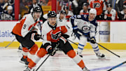 Oct 16, 2025; Philadelphia, Pennsylvania, USA; Philadelphia Flyers right wing Travis Konecny (11) carries the puck into the zone against the Winnipeg Jets during the second period at Wells Fargo Center. Mandatory Credit: Eric Hartline-Imagn Images