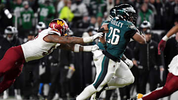 Jan 26, 2025; Philadelphia, PA, USA; Philadelphia Eagles running back Saquon Barkley (26) runs with the ball against the Washington Commanders during the second half in the NFC Championship game at Lincoln Financial Field. Mandatory Credit: Eric Hartline-Imagn Images