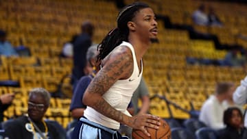 Apr 24, 2025; Memphis, Tennessee, USA; Memphis Grizzlies guard Ja Morant (12) shoots during warm ups prior to game three for the first round of the 2024 NBA Playoffs against the Oklahoma City Thunder at FedExForum. Mandatory Credit: Petre Thomas-Imagn Images
