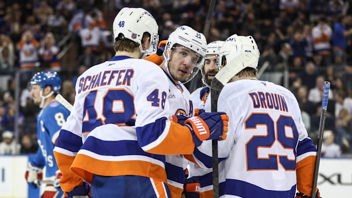 Nov 8, 2025; New York, New York, USA;  New York Islanders center Bo Horvat (14) celebrates with his teammates after his second goal of the game in the second period against the New York Rangers at Madison Square Garden. Mandatory Credit: Wendell Cruz-Imagn Images