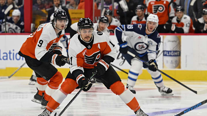 Oct 16, 2025; Philadelphia, Pennsylvania, USA; Philadelphia Flyers right wing Travis Konecny (11) carries the puck into the zone against the Winnipeg Jets during the second period at Wells Fargo Center. Mandatory Credit: Eric Hartline-Imagn Images Oct 16, 2025; Philadelphia, Pennsylvania, USA; Philadelphia Flyers right wing Travis Konecny (11) carries the puck into the zone against the Winnipeg Jets during the second period at Wells Fargo Center. Mandatory Credit: Eric Hartline-Imagn Images