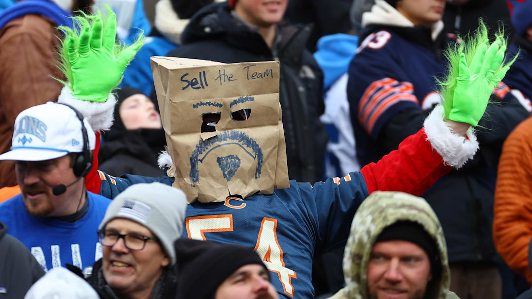 Dec 22, 2024; Chicago, Illinois, USA; A Chicago Bear fan reacts during the second half against the Detroit Lions at Soldier Field. Mandatory Credit: Mike Dinovo-Imagn Images