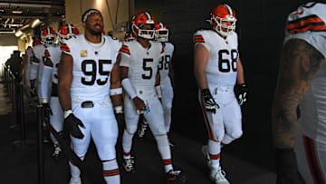 Oct 13, 2024; Philadelphia, Pennsylvania, USA; Cleveland Browns defensive end Myles Garrett (95), quarterback Jameis Winston (5) and guard Michael Dunn (68) in the tunnel against the Philadelphia Eagles at Lincoln Financial Field. Mandatory Credit: Eric Hartline-Imagn Images