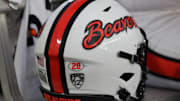 Sep 13, 2025; Lubbock, Texas, USA;  A general view of the PAC 12 logo on the back of the Oregon State Beavers helmet on the bench during the game against the Texas Tech Red Raiders at Jones AT&T Stadium. Mandatory Credit: Michael C. Johnson-Imagn Images
