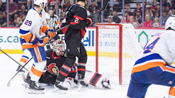 Oct 18, 2025; Ottawa, Ontario, CAN; New York Islanders center Bo Horvat (14) scores against Ottawa Senators goalie Linus Ullmark (35) in the second period at the Canadian Tire Centre. Mandatory Credit: Marc DesRosiers-IMAGN Images