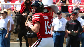 Sep 14, 2024; Lubbock, Texas, USA;  Texas Tech Red Raiders quarterback Will Hammond (15) drops back to pass against the North Texas Mean Green in the second half at Jones AT&T Stadium and Cody Campbell Field. Mandatory Credit: Michael C. Johnson-Imagn Images