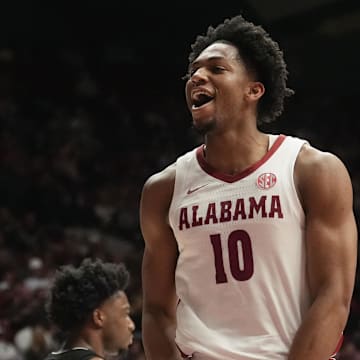 Feb 25, 2025; Tuscaloosa, AL, USA;  Alabama forward Mouhamed Dioubate (10) reacts after getting a dunk against Mississippi State at Coleman Coliseum. Mandatory Credit: Gary Cosby Jr./USA TODAY Network via Imagn Images