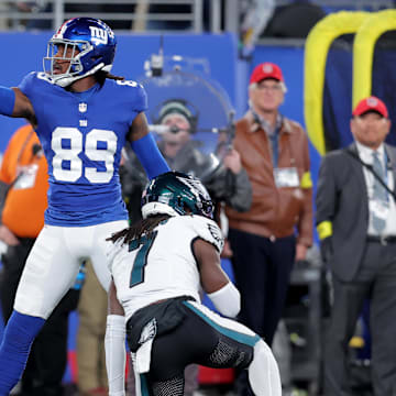 Oct 9, 2025; East Rutherford, New Jersey, USA; New York Giants wide receiver Lil'Jordan Humphrey (89) signals first down after catching a pass against Philadelphia Eagles cornerback Kelee Ringo (7) during the first quarter at MetLife Stadium.  